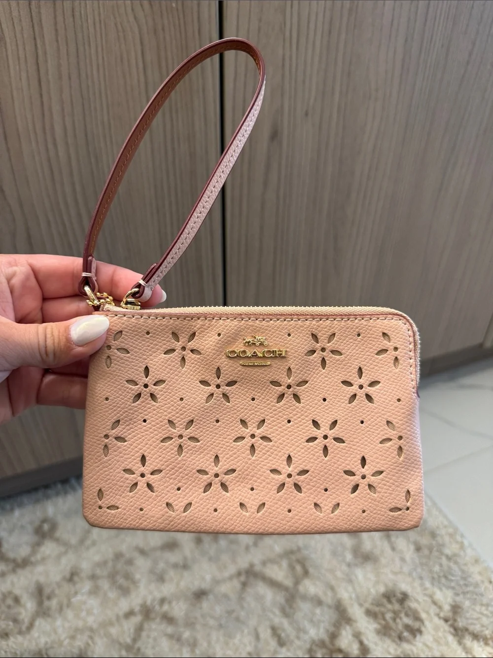Coach Peach Floral Perforated Wristlet